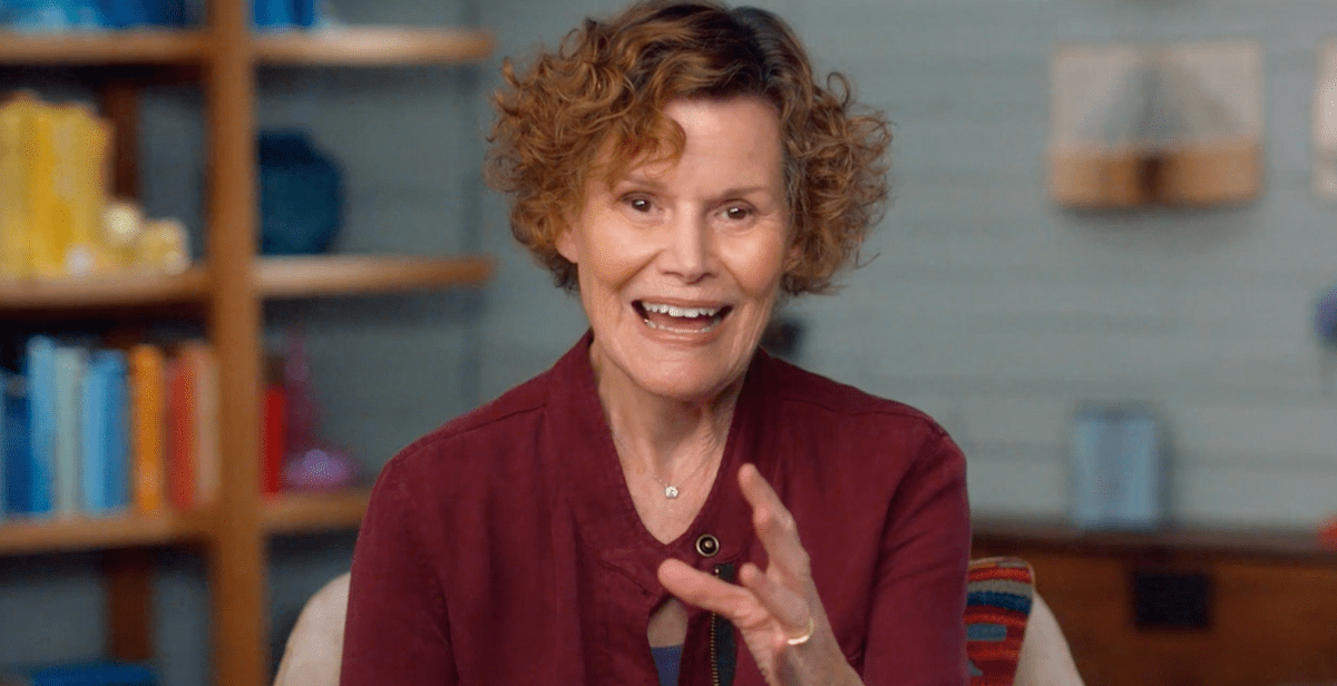 Judy Blume smiling as she lectures in her MasterClass